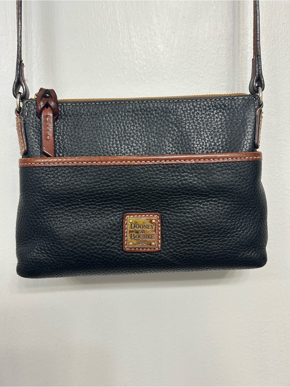 Vintage Dooney & Bourke Black Leather Crossbody with Brown Trim and Logo Plaque